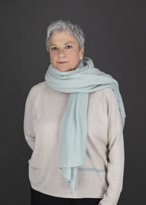 woman wearing travel wrap in mint colour