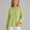 cotton jumper with long sleeves in winter lime colour presented by woman