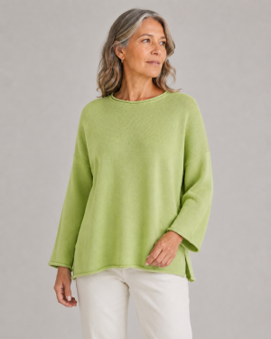 cotton jumper with long sleeves in winter lime colour presented by woman