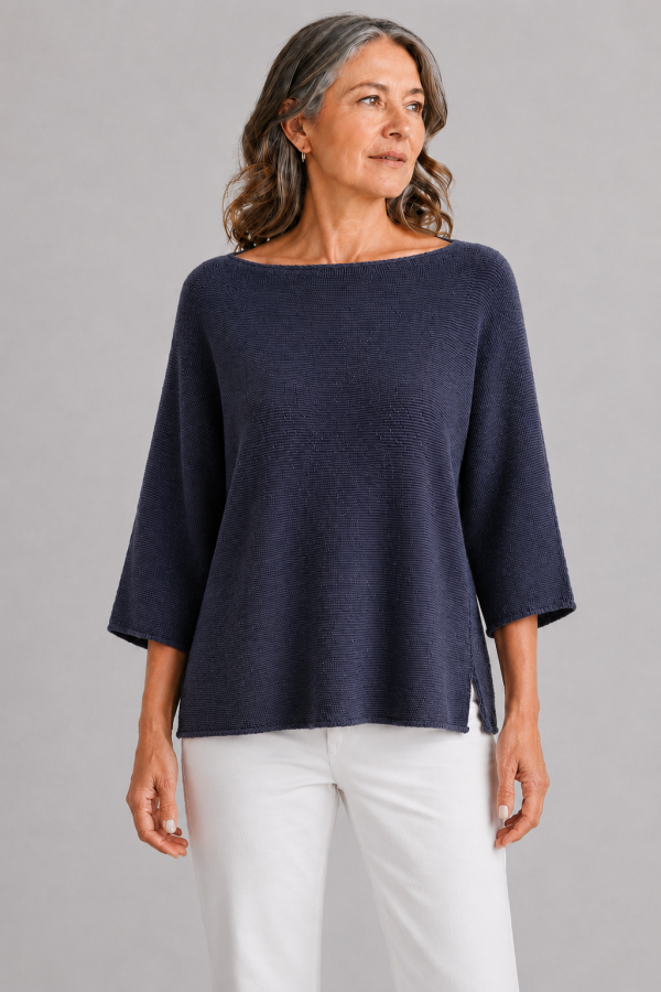 organic cotton jumper in navy colour presented by older woman