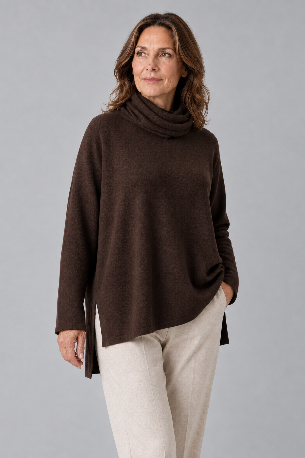 oversized jumper with turtle neck in bitter chocolate colour front view, presented by women fashion model