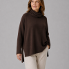 Carole-oversized-jumper-bitter-chocolate-front-model - Ochre Knitwear oversized jumper with turtle neck in bitter chocolate colour front view, presented by women fashion model
