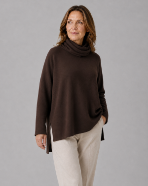 oversized jumper with turtle neck in bitter chocolate colour front view, presented by women fashion model