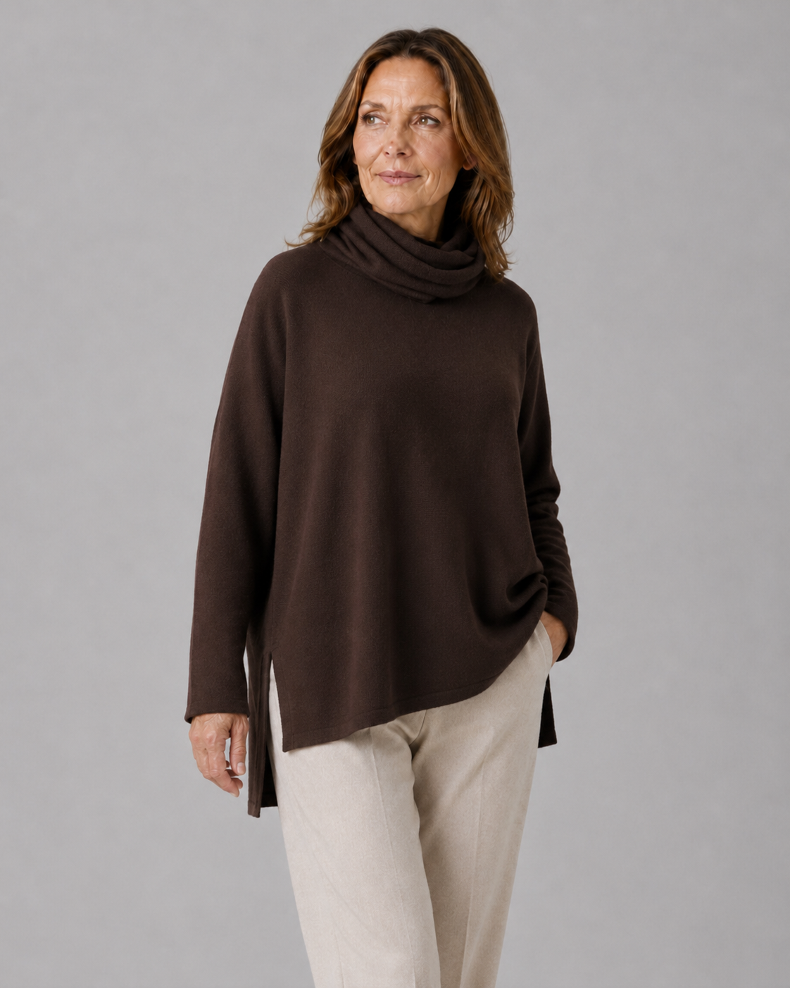 oversized jumper with turtle neck in bitter chocolate colour front view, presented by women fashion model