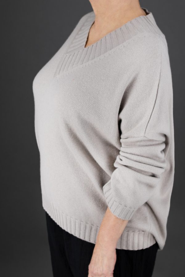 V-neck sweater side view