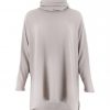 oversized jumper with turtle neck in mushroom colour front view