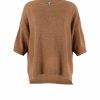Jumper with dropped shoulders in almond color, front view.