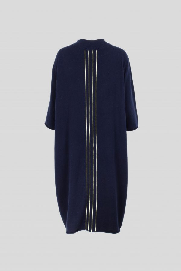 knitted dress, calf length with boat shaped neck 2 side pockets and 4 contrasting colour fine vertical stripes, back view