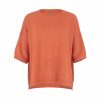 a jumper featuring dropped shoulders, presented in a vibrant flame colour, and shown from the front view