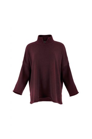 an oversized jumper featuring long sleeves, a high ribbed neckline, and a center front opening, presented in a burgundy colour, viewed from the front
