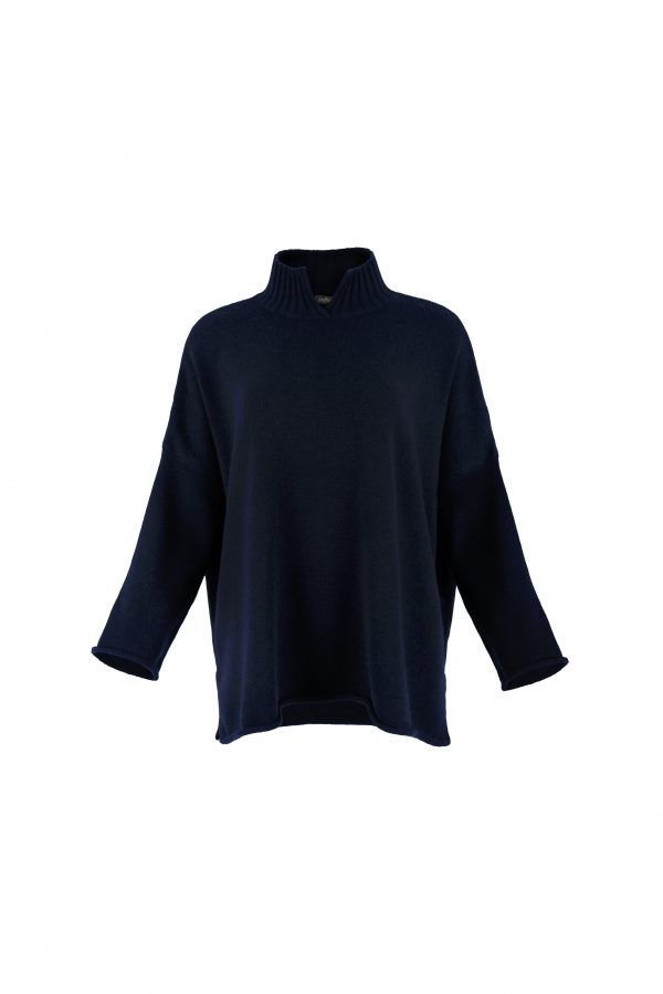 an oversized jumper featuring long sleeves, a high ribbed neckline, and a center front opening, presented in a navy colour, viewed from the front
