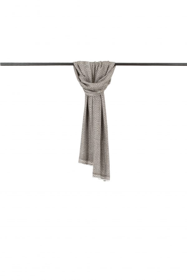 A herringbone muffler scarf featuring cappuccino and cream colours.