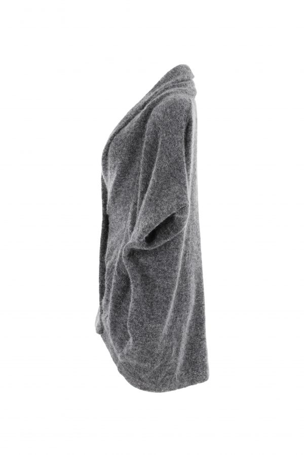 a mohair cardigan featuring short sleeves, two side pockets, and a cocoon shape, presented in a profile view