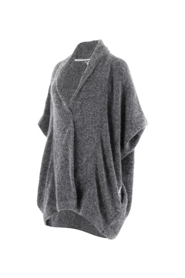 a mohair cardigan featuring short sleeves, two side pockets, and a cocoon shape, presented in a side view