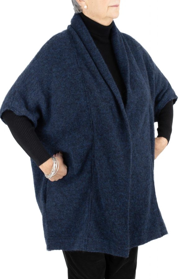 samba-mohair-cardigan-dark-navy-colour-side-view - Ochre Knitwear a mohair cardigan featuring short sleeves, two side pockets, and a cocoon shape, presented in a side view