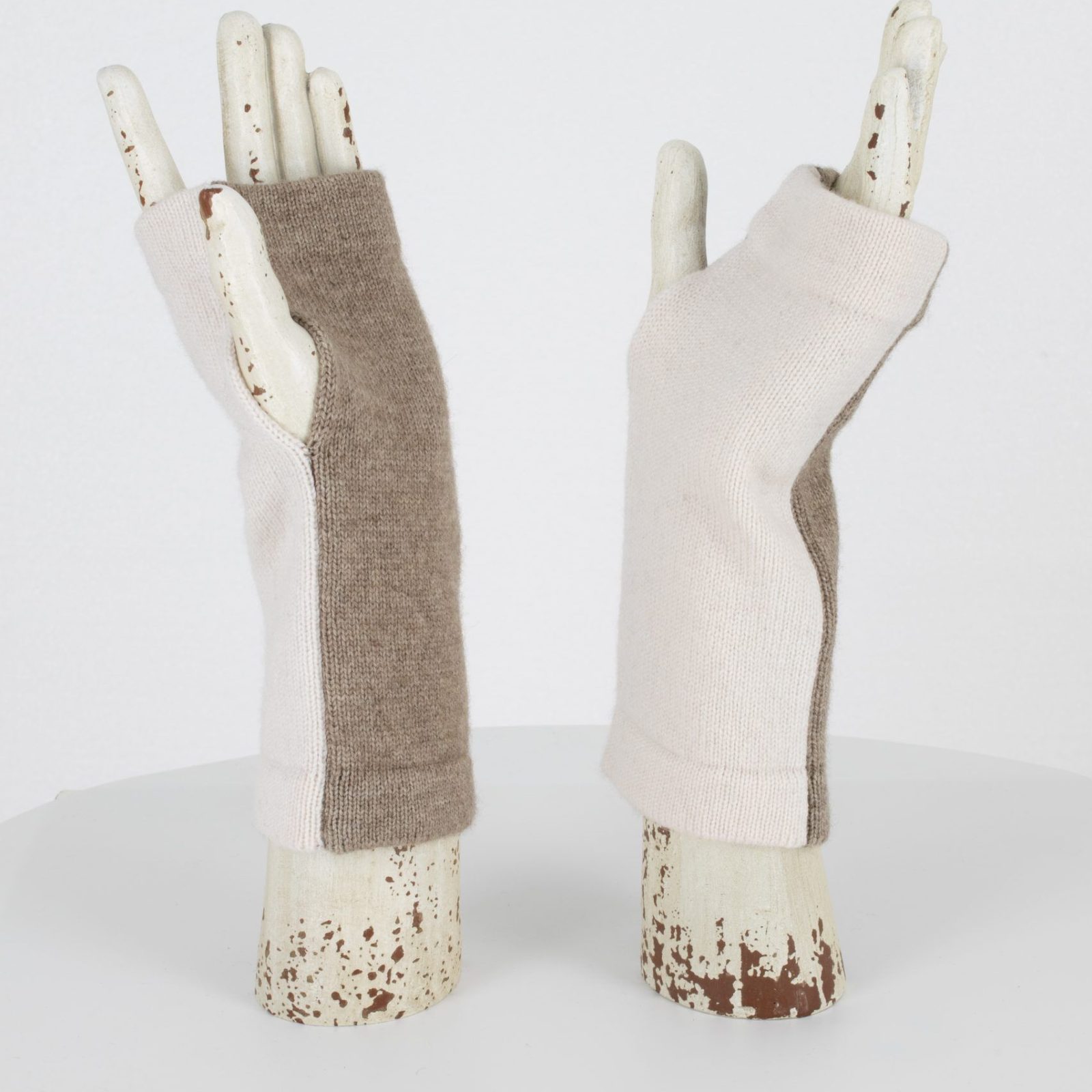 wrist warmers in two contrasting mocha and snow colours