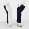 wrist warmers in two contrasting navy and snow colours