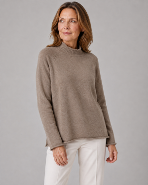 jumper with long sleeves and side split in mocha colour made from cashmere, front view, presented by mature woman model