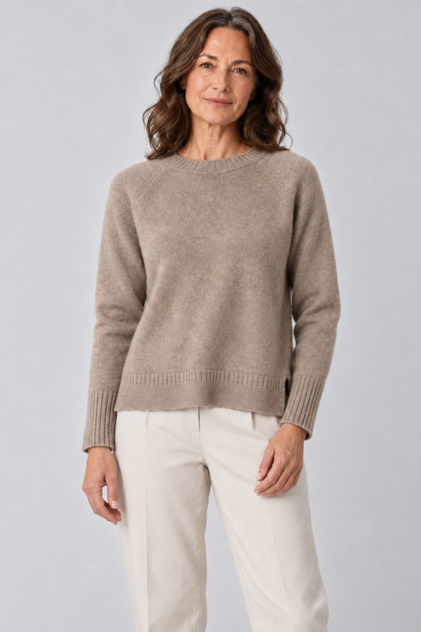 Devon-raglan-sleeve-jumper-mocha-colour-front-view-model - Ochre Knitwear raglan sleeve jumper with long sleeves, side split in mocha colour presented by female model