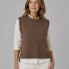 knitted vest features round neck, sleeveless, longer at the back with side split in chestnut colour, front view, presented by female model