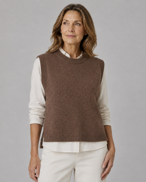 knitted vest features round neck, sleeveless, longer at the back with side split in chestnut colour, front view, presented by female model