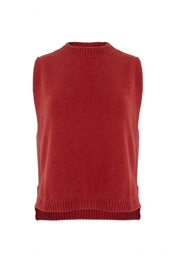 Lula knitted vest features round neck, sleeveless, longer at the back with side split in rust colour, front view