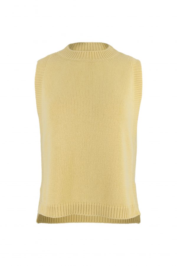 Lula knitted vest features round neck, sleeveless, longer at the back with side split in turmeric colour, front view