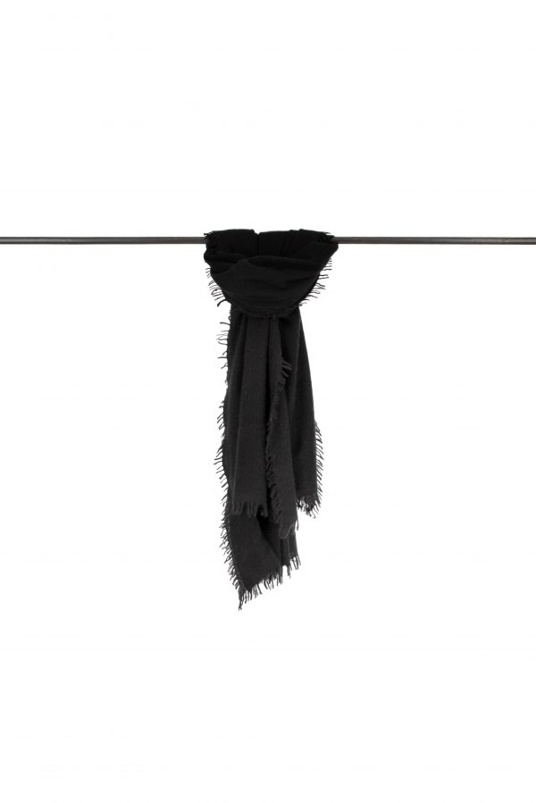 Black cashmere shawl with fringed edges, draped