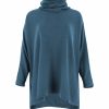 oversized jumper with turtle neck in teal colour front view
