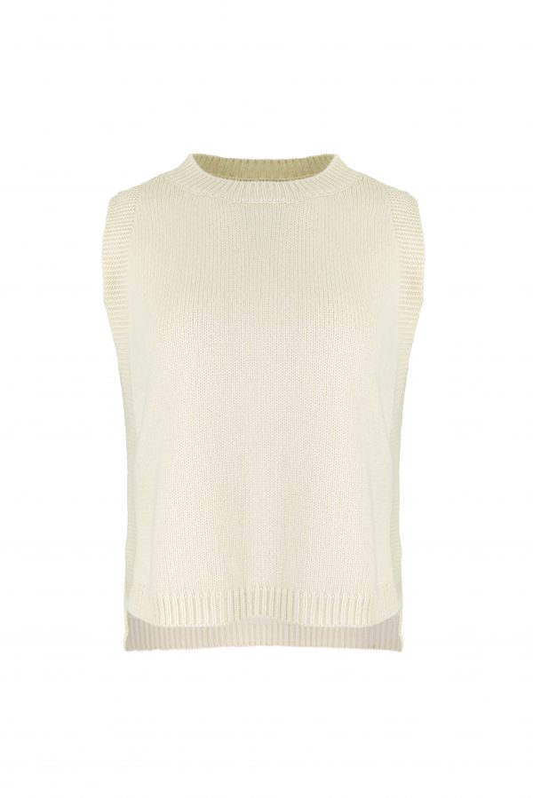 knitted vest features round neck, sleeveless, longer at the back with side split in buttermilk colour, front view