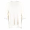 high low knit jumper in cashmere blend with boat neckline and relaxed silhouette profile view