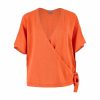 Wrap tie knit top with front tie detail, orange peel colour