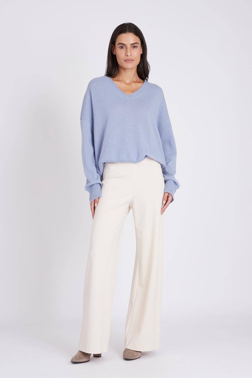 how to style a light blue cashmere sweater, guide, women wearing light blue sweater