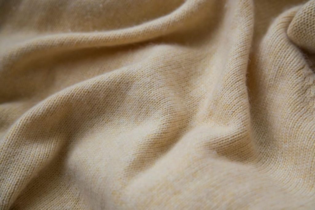 sample why cashmere gets softer over time, cashmere throw in beige colour