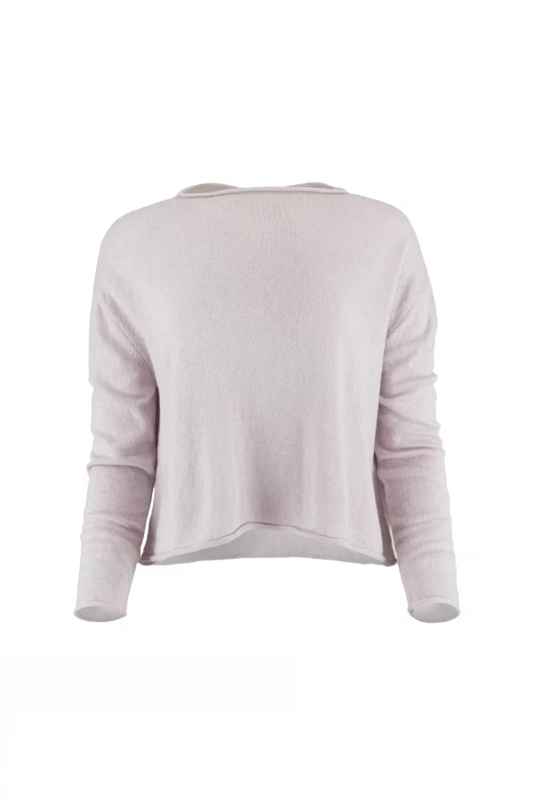 Back view of a person wearing a light pink knit sweater with a wide neckline edge visible at the shoulders