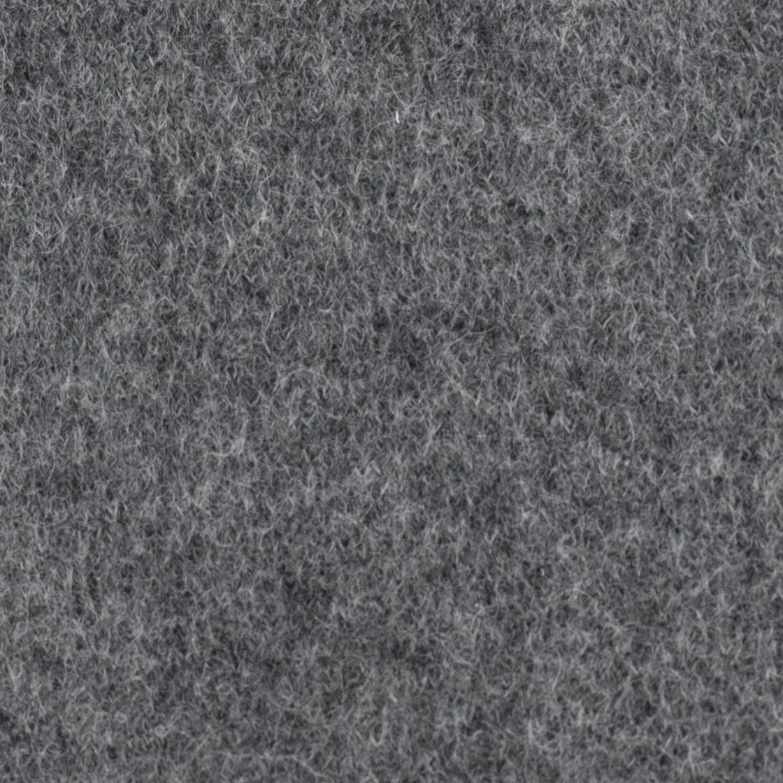 Close-up of gray fuzzy fabric texture showing soft interwoven fibers.