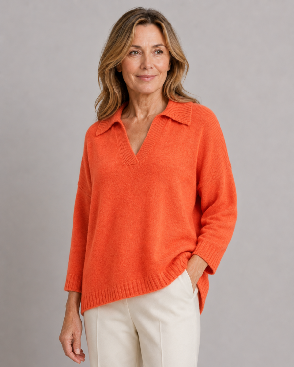 froyo-collared-v-neck-jumper-front-flame-model - Ochre Knitwear collared V-Neck jumper with wide ribbed collar, dropped shoulders, open placket and curved ribbed hem, in flame colour