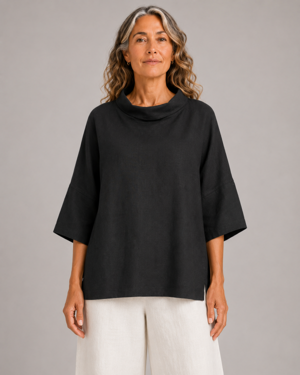 linen cowl neck top in black organic linen with folded neckline and wide short sleeves, presented by model, front view