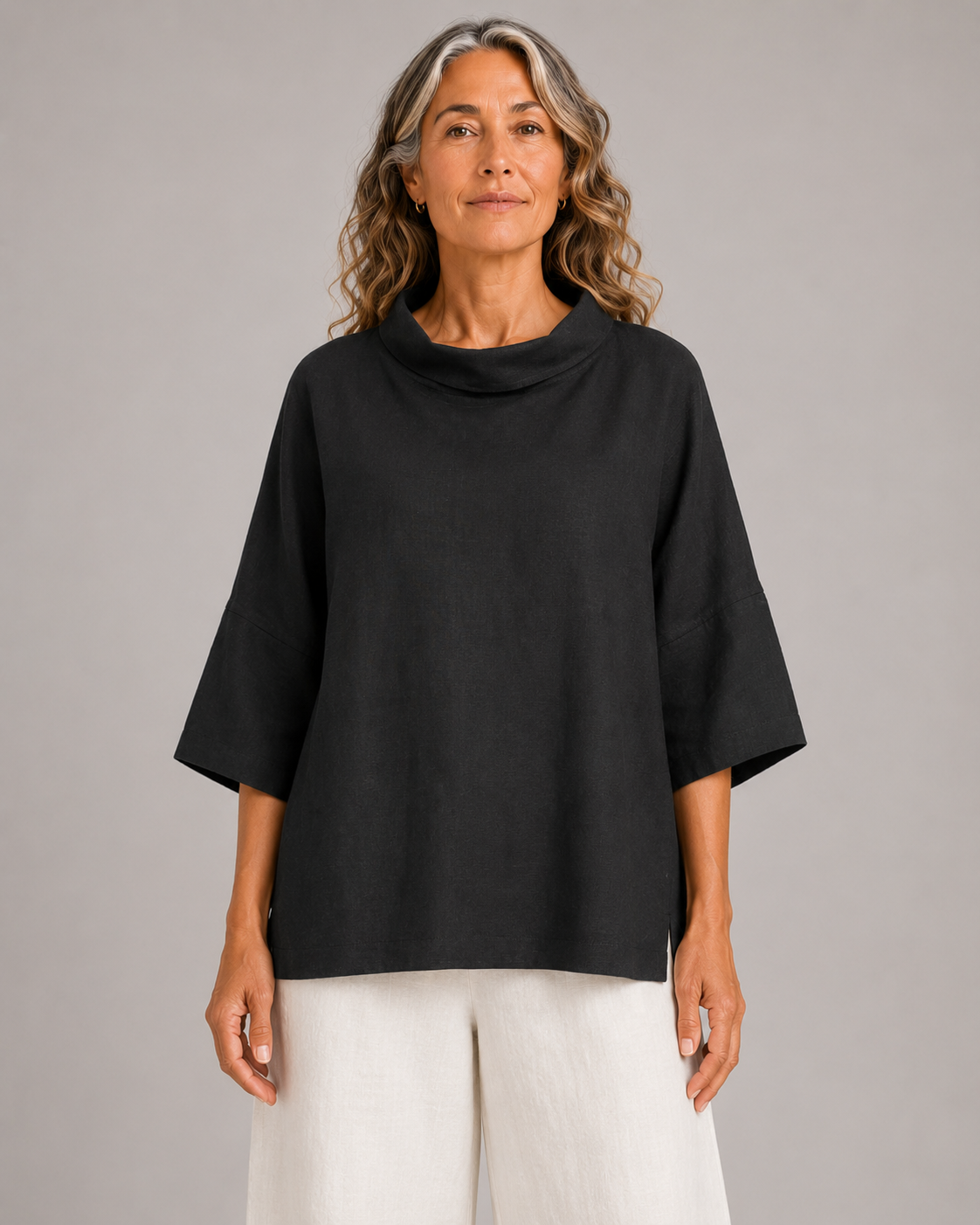 mull-linen-cowl-neck-top-black-front - Ochre Knitwear linen cowl neck top in black organic linen with folded neckline and wide short sleeves, presented by model, front view