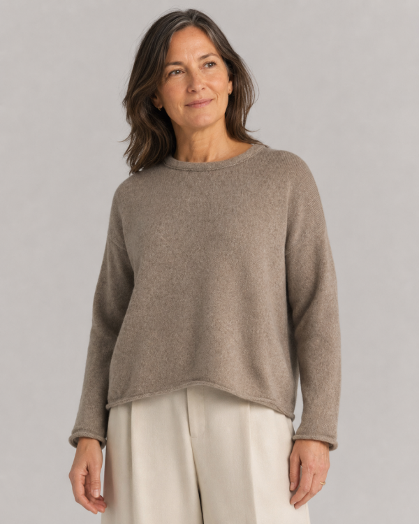 Rina-yak-wool-jumper-mocha-model - Ochre Knitwear yak wool jumper, showing the relaxed crew neckline, dropped shoulders and softly cropped fit, presented by female model