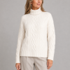 aran roll neck jumper with high ribbed collar, raised cable panels, diamond stitch detail and deep ribbed hem, front view, presented by model