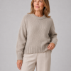 chunky crew neck jumper with relaxed fit and ribbed trims, presented on mature female model