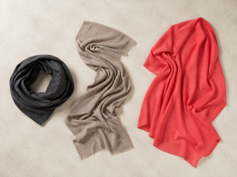 Ochre Fine Scarves and Cashmere Travel Wrap arranged to compare a muffler, scarf and wrap